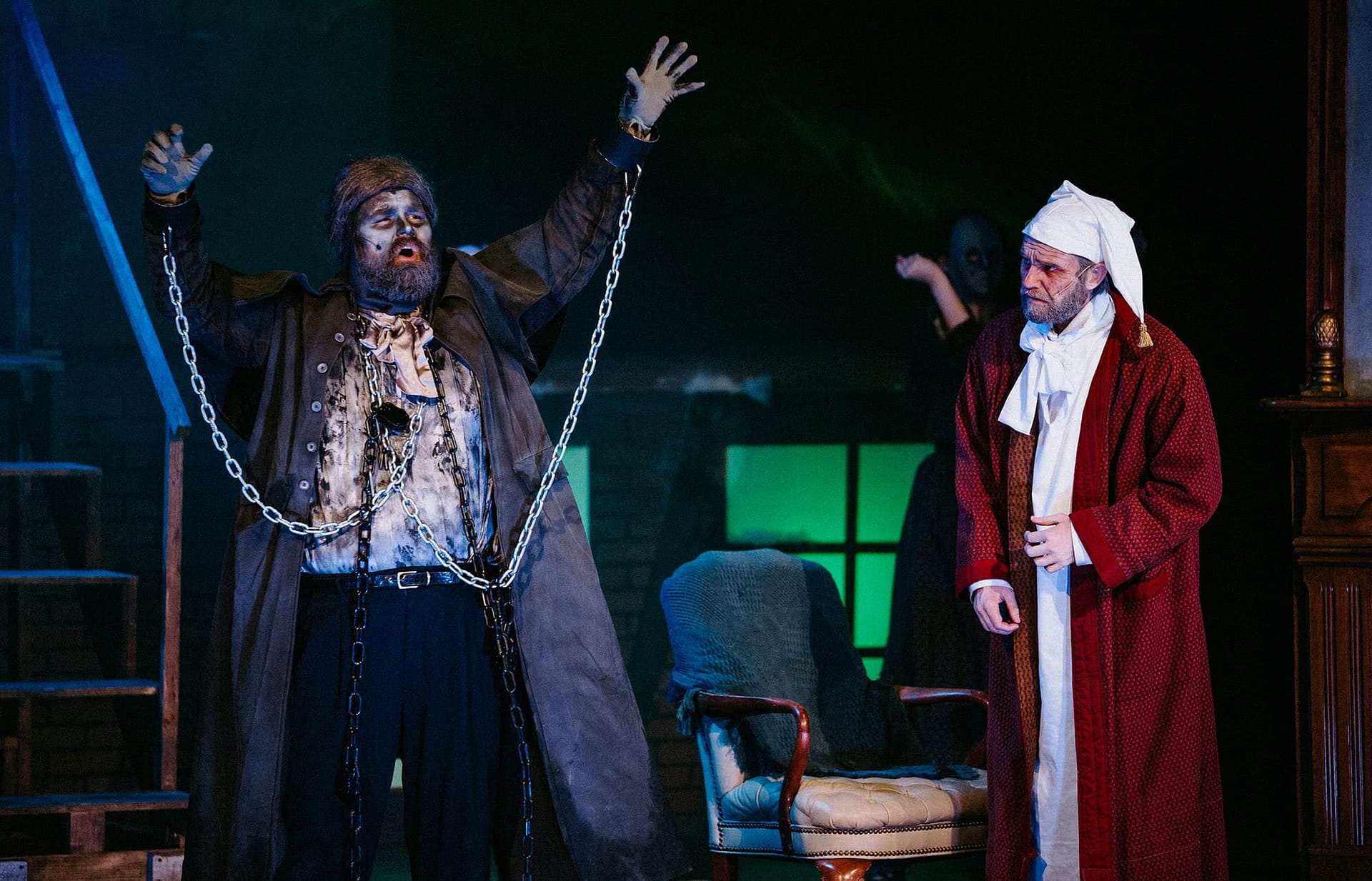 Scrooge sees a vision of Marley