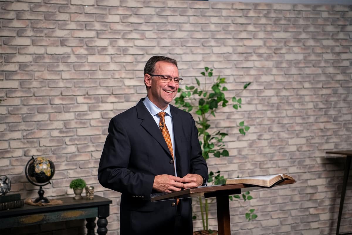 Pastor Redlin recording a chapel session