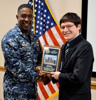 Jason Goosman with award
