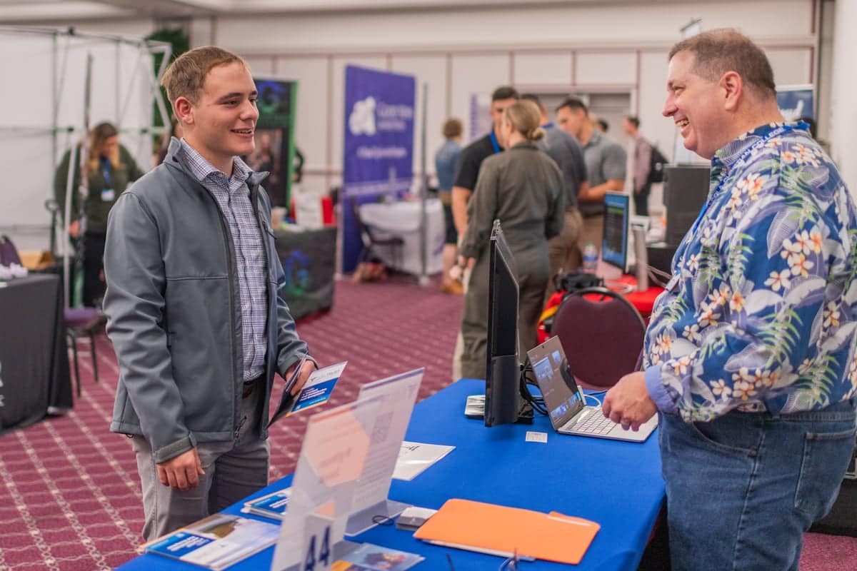 PCC Student connects with a Trust Fuel Representative at the Career Fair