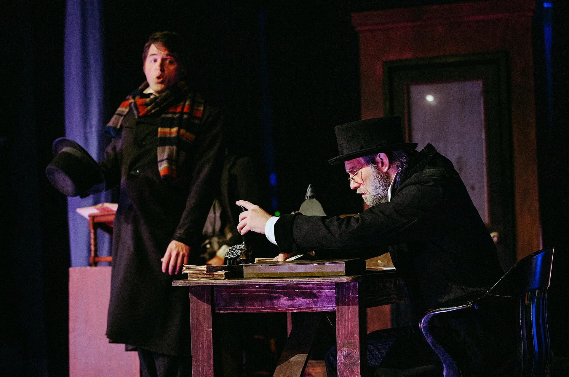 Mr. Scrooge and Fred in the office