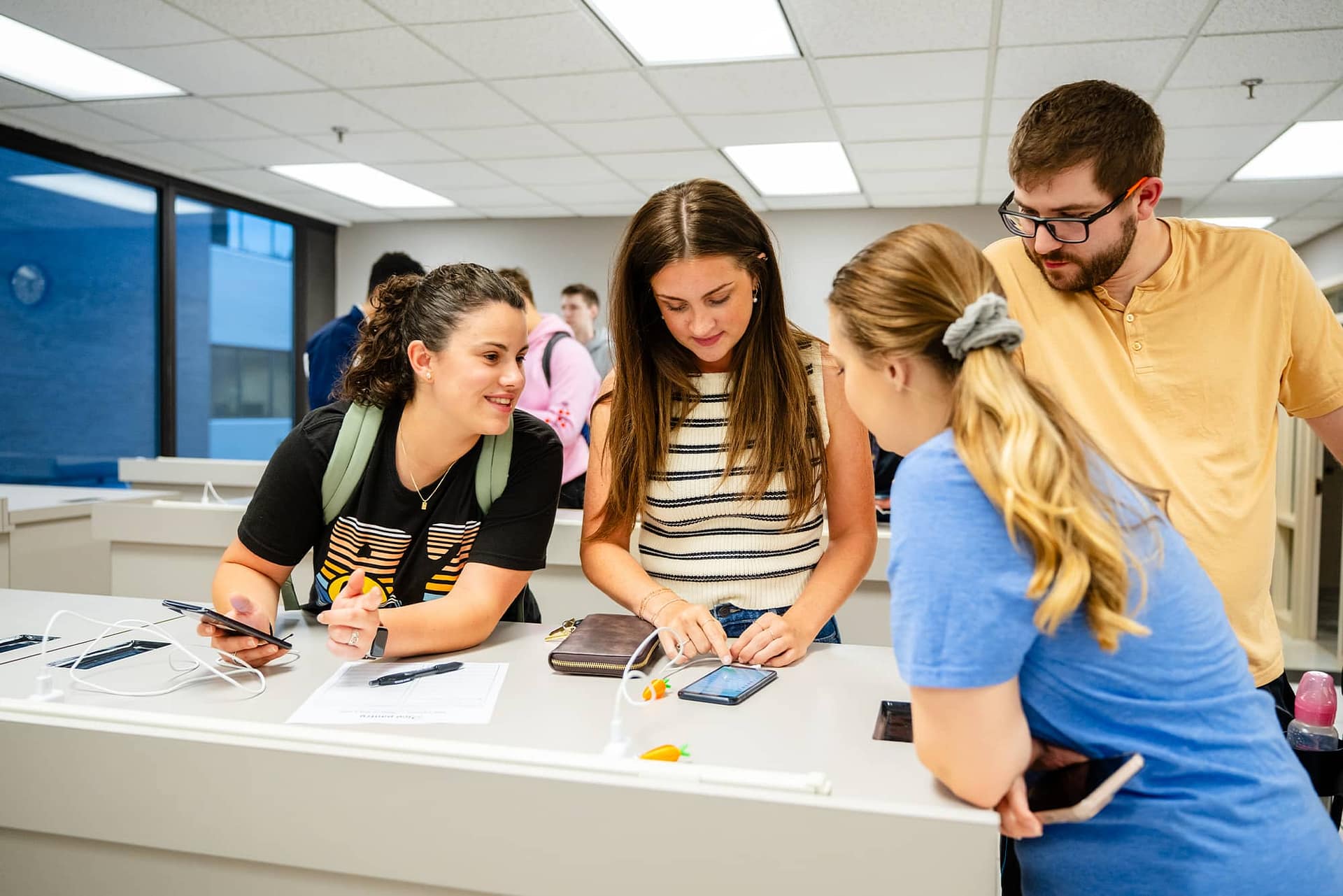 Slideshow-1 students testing out software expo project