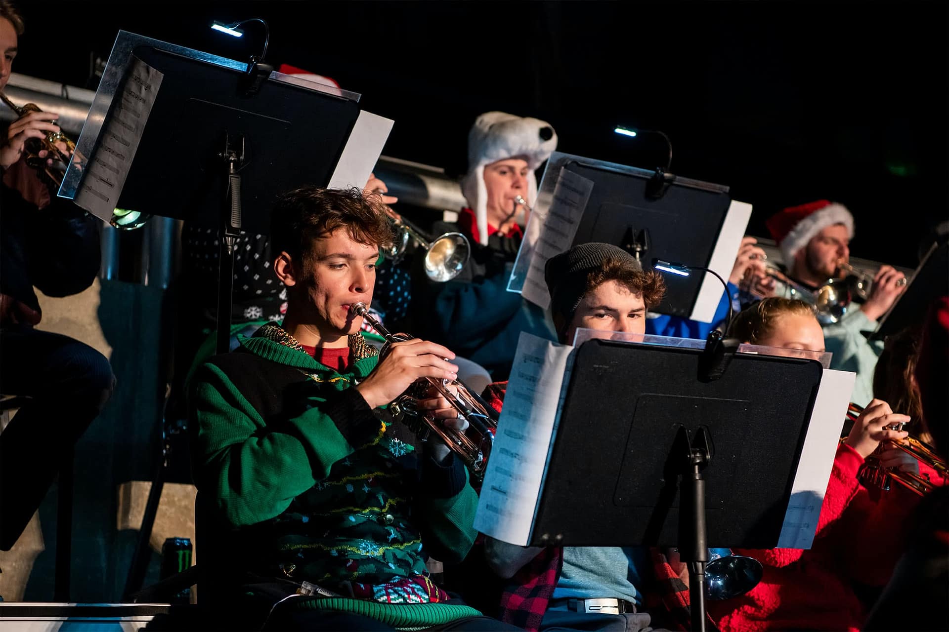 A male student plays the trumpet as part of the Symphonic Band