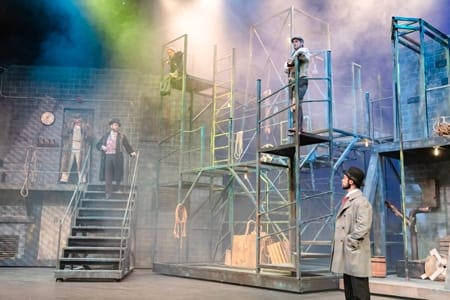 Actors on the Fine Arts production Sherlock Homes and the Purloined Letters Stepney Warehouse stage set.