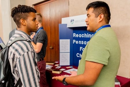 Christian Service Expo Men's Door-to-Door Outreach booth