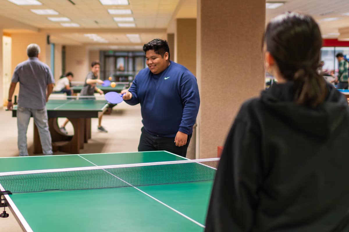 Student play games in the commons