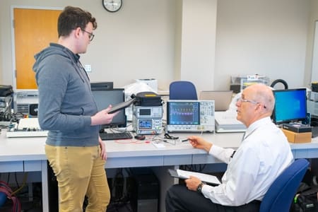 Dr. Keith Francis speaks with a student