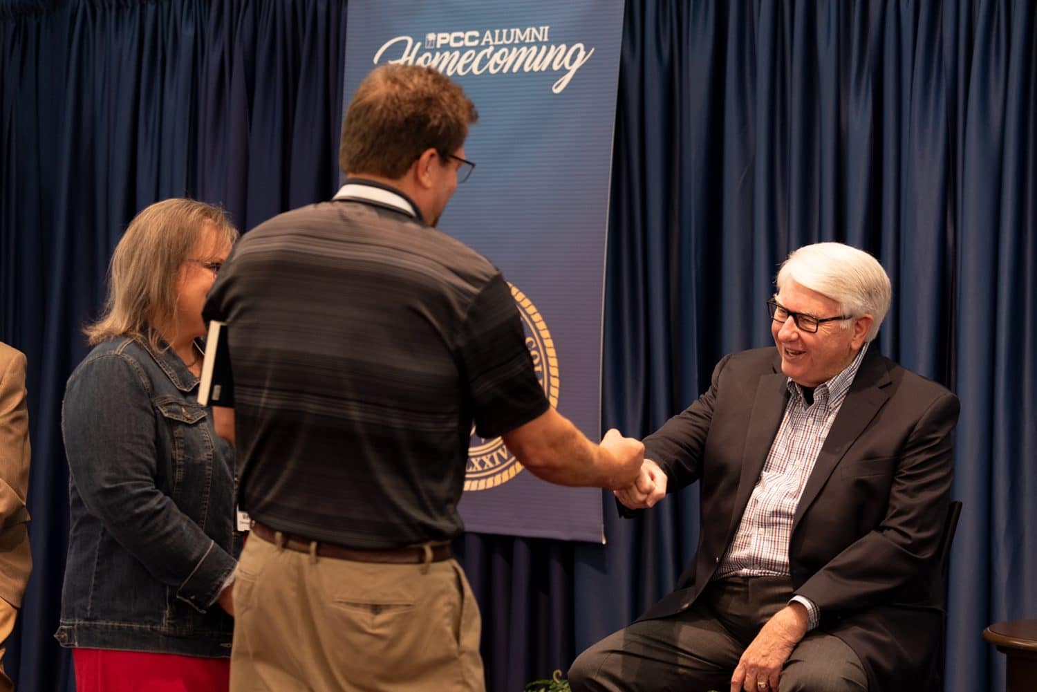 people-talking Alumni talking together.