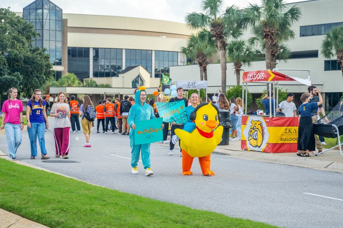 nr-greek-rush-duck PCC students enjoy fun costumes supporting their collegians at PCC's 2026 Greek Rush Event