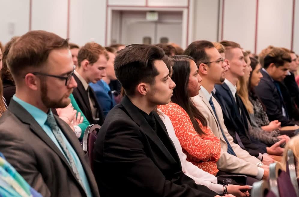Criminal Justice students listen to Michael Goehring talk about his time in the Secret Service at an academic forum.