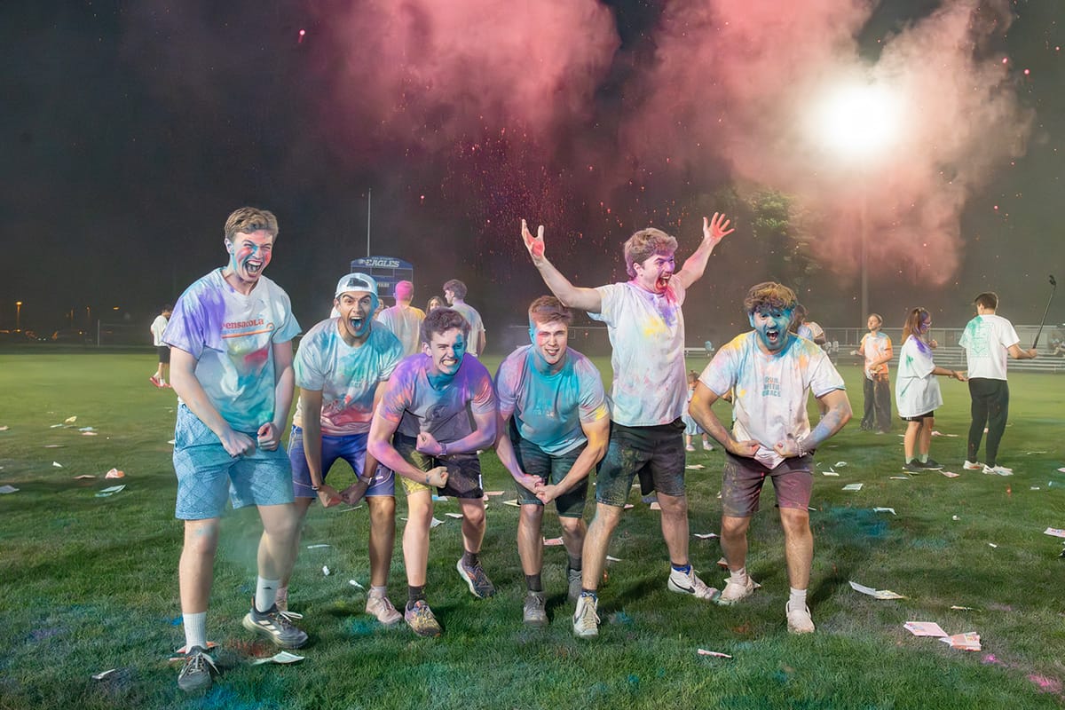 Students celebrating with chalk powder