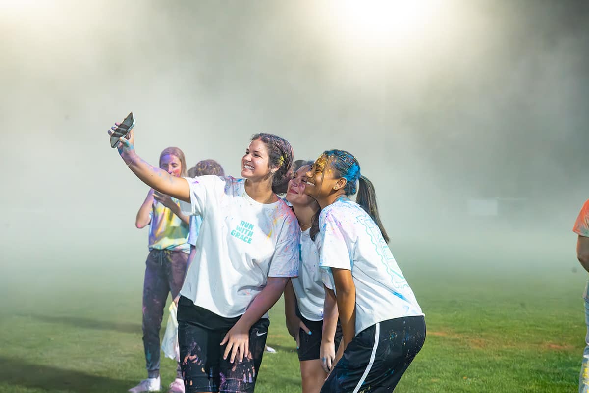 Friends celebrating after Missions Run