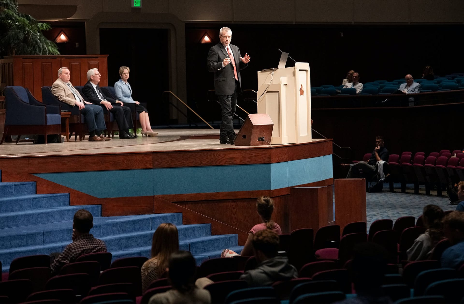 Dr. Rick Green speaking to students during chapel on the Crowne Centre stage.