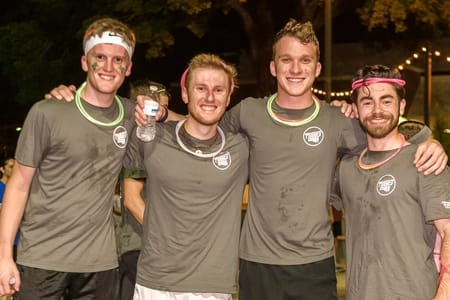 Four students participating at the Missions Run.