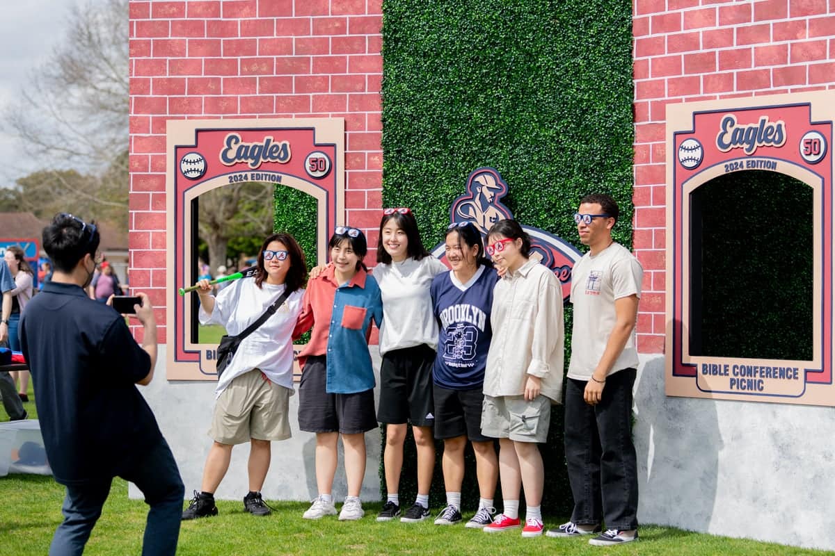 Group takes pictures at the Bible Conference Picnic