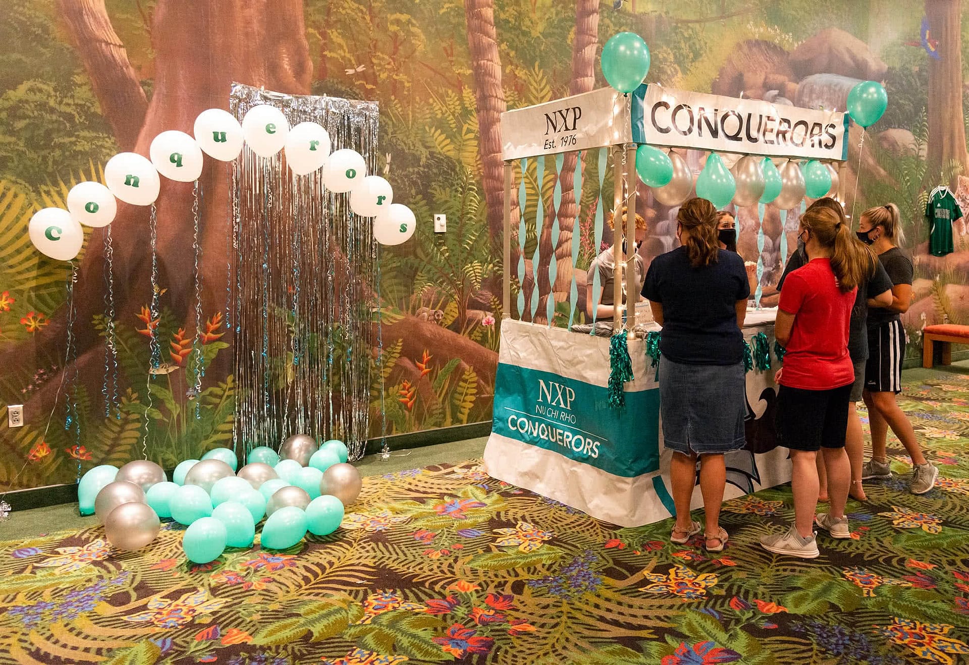 Several girls talk about joining the Conquerer's collegian