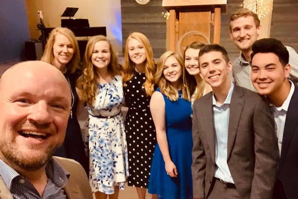 Proclaim singers posing together for a photo. 