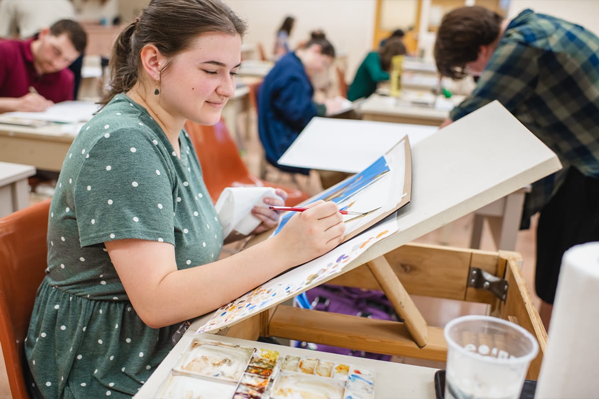 Visual Arts Student Working on a Project