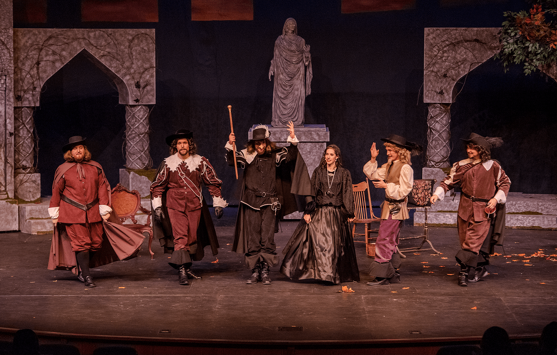The cast bows and receives applause
