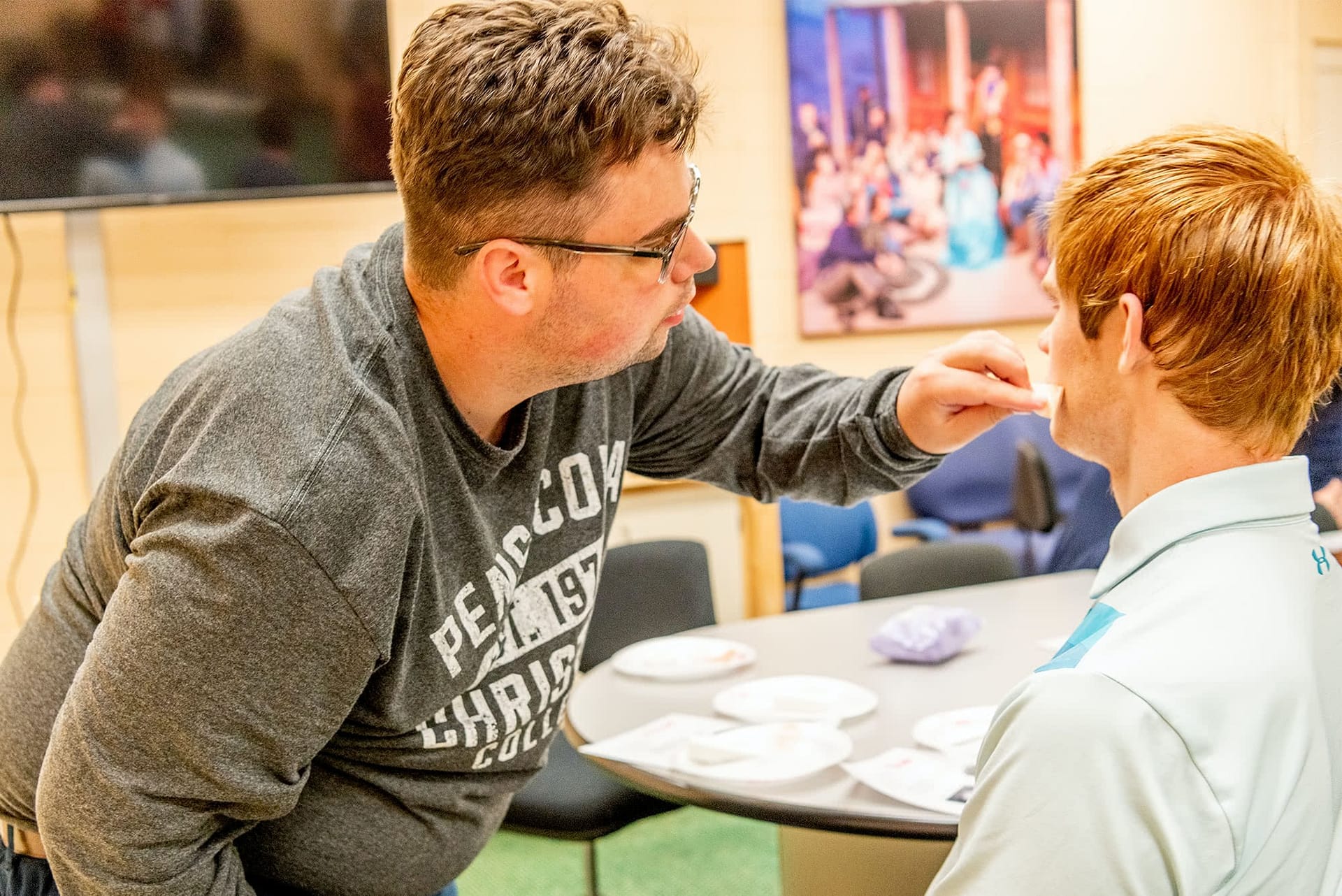 Actors putting on stage makeup