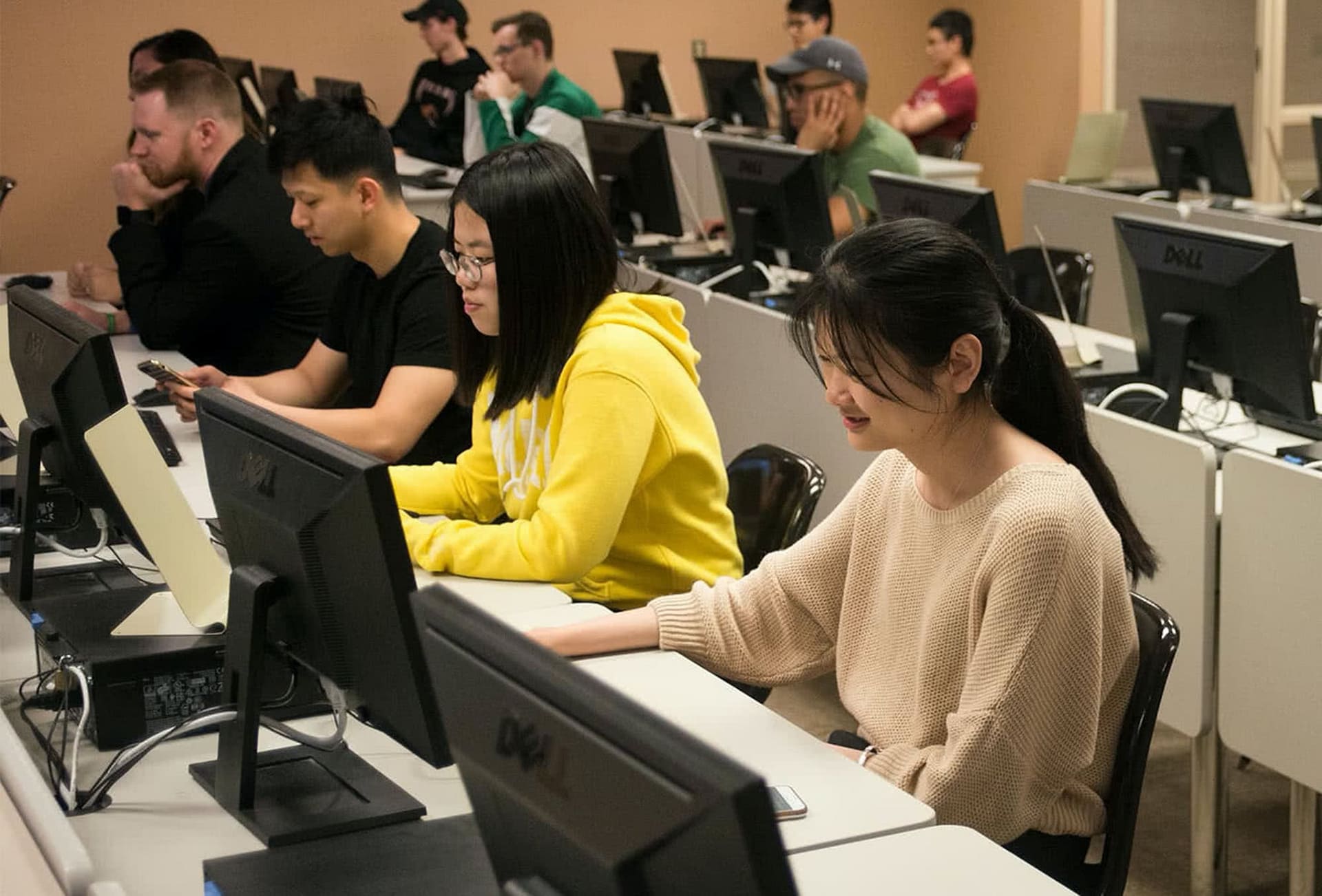 Students gather in a computer lab for the Software Expo