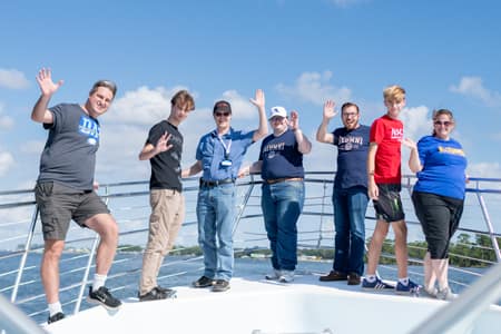 PCC alumni on a dolphin cruise