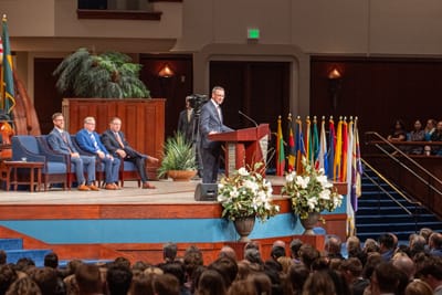 Pastor Redlin speaking to congregation