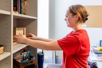 PCC student sets up her room decor