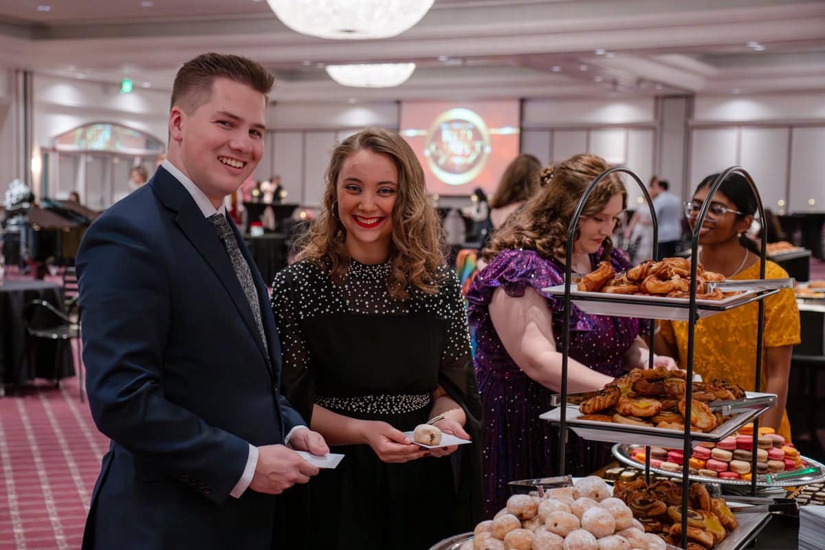 PCC students enjoy the food served at the Red Carpet Event.