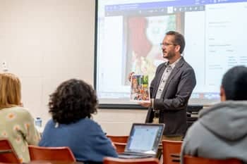 Mr. Greg Hewitt teaching in class