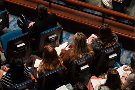 Students listening to preaching