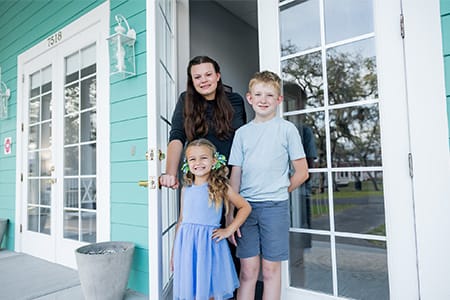 Children looking out doorway
