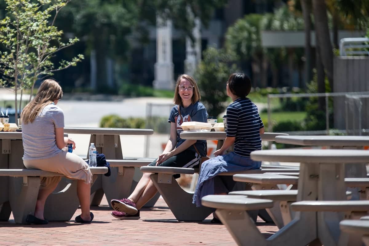 Life on Campus, Three girls having lunch on varsity terrance