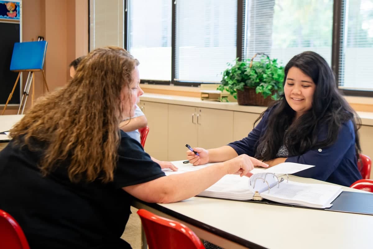 PCC graduates study together as part of their graduate classes