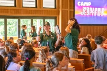 Team Leaders at Camp O' the Pines work with several campers.