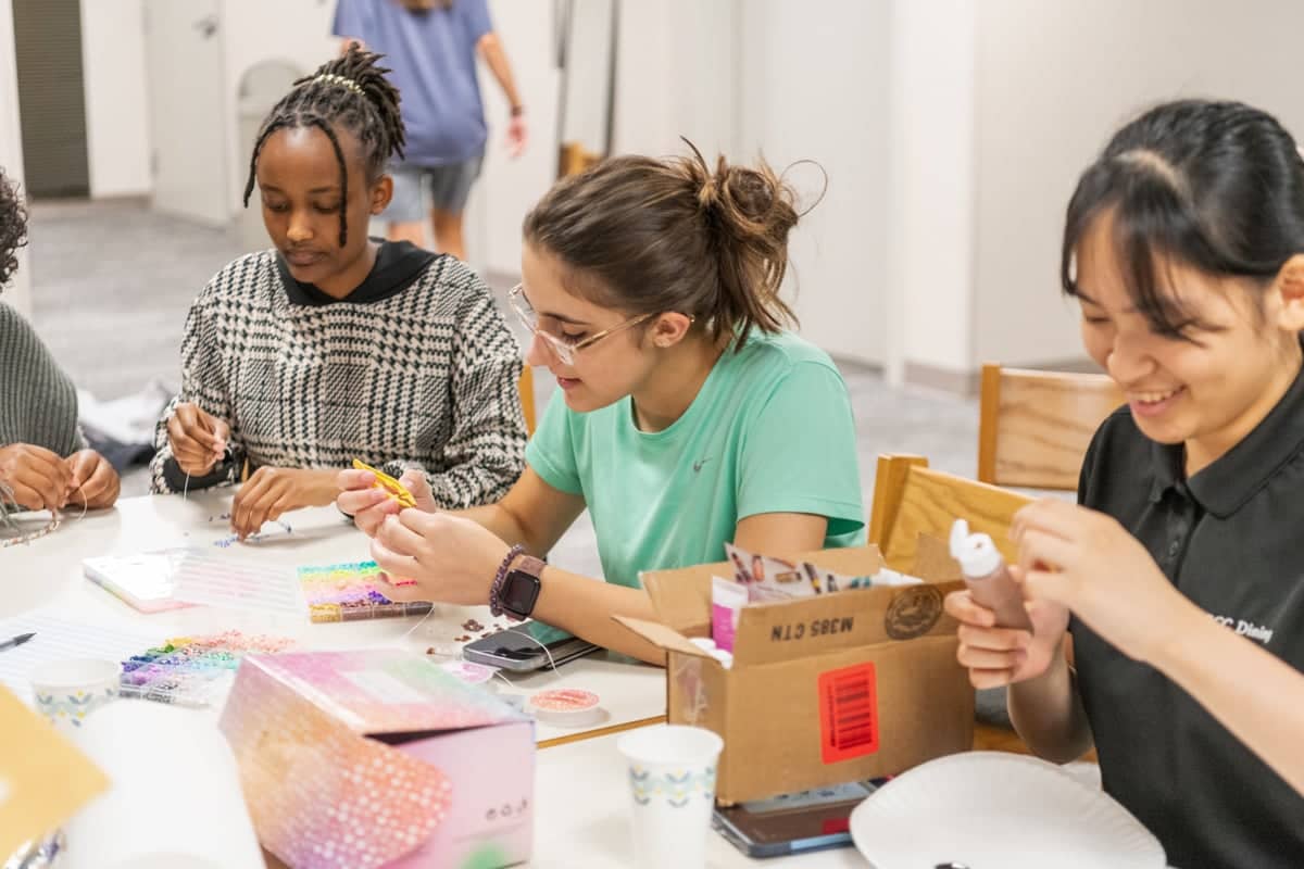 PCC summer workers enjoy making crafts with friends