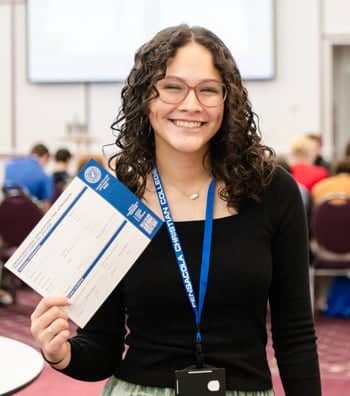 Girl holding a PCC application form