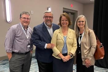 The Wengers pose with the Shoemakers at the Alumni Reconnect